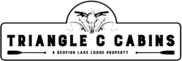 Logo of Triangle C Cabins, a Redfish Lake Lodge property, featuring paddles and a stylized mountain motif.